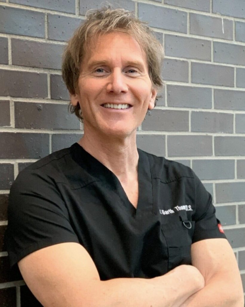 a photo of doctor garth thoms